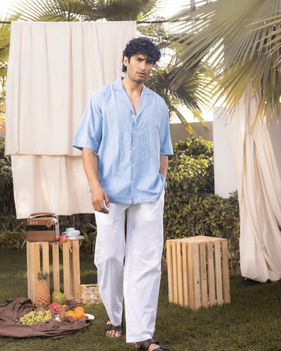 Lightweight summer shirt for men in powder blue with relaxed fit and minimal embroidery
